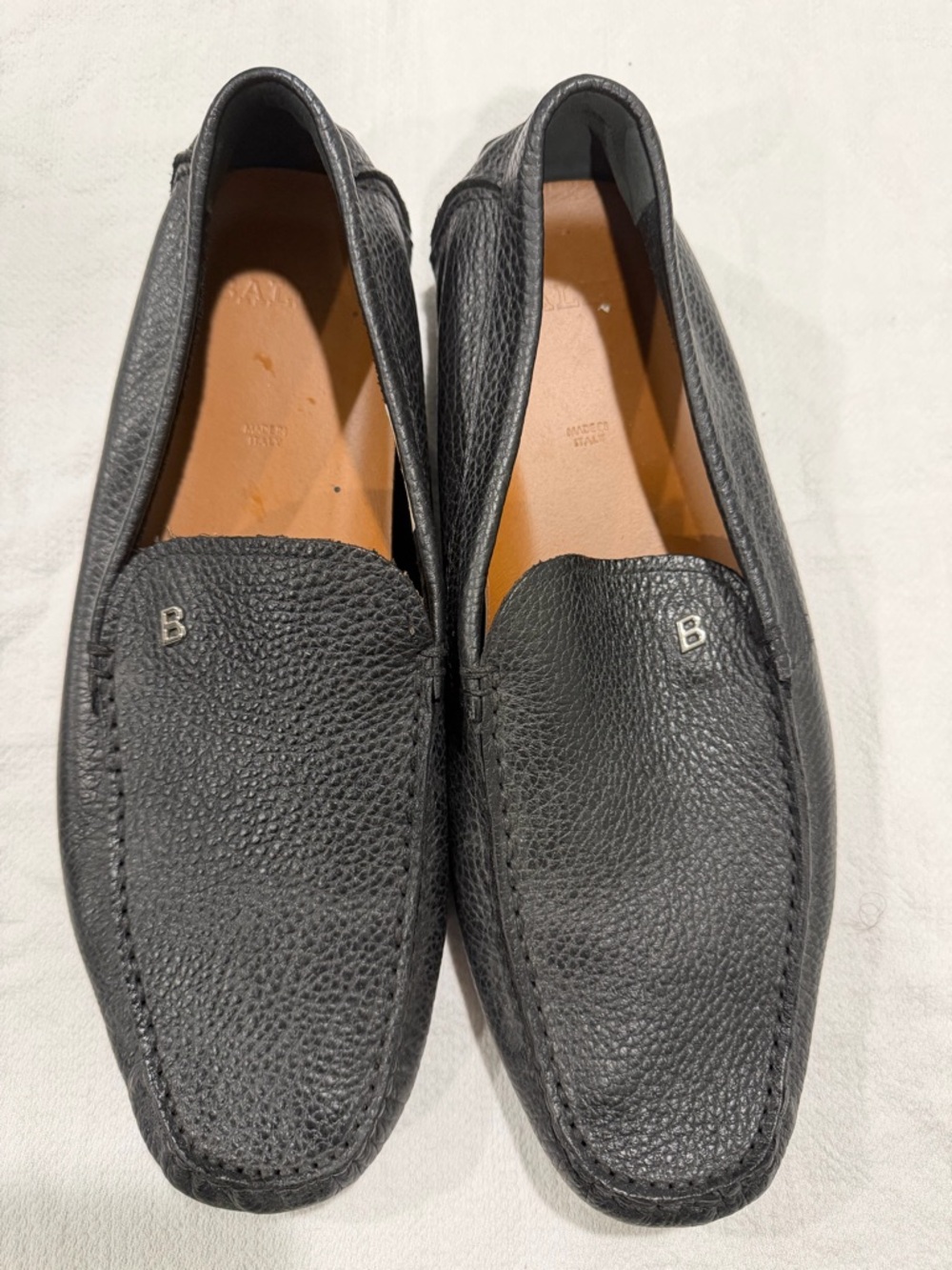 Bally Black Pebbled Leather Slip-On Loafers with 'B' Metal Accent
